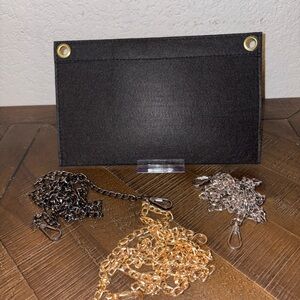 Make your clutch a crossbody. 3 chains & felt